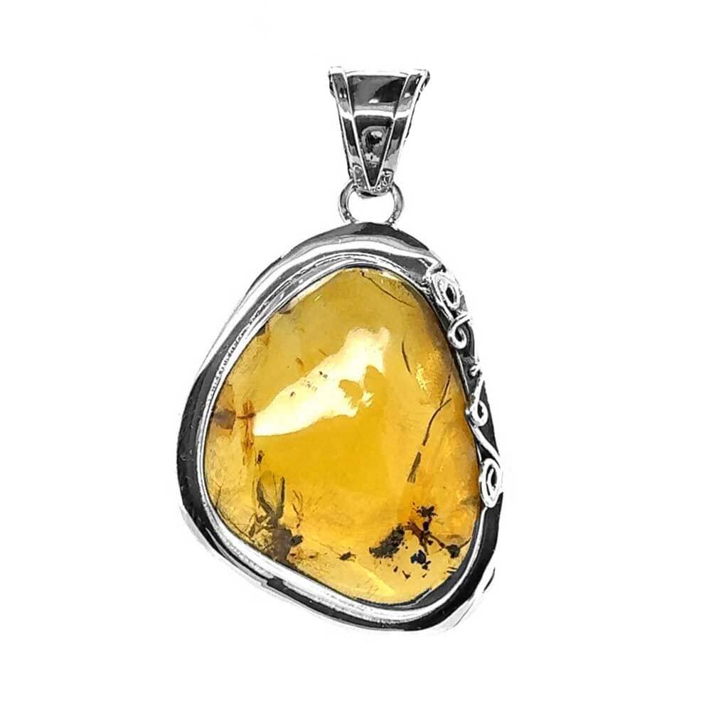 Amber-Pendant-with-Motif-in-950-Silver-front-Nueve-Sterling