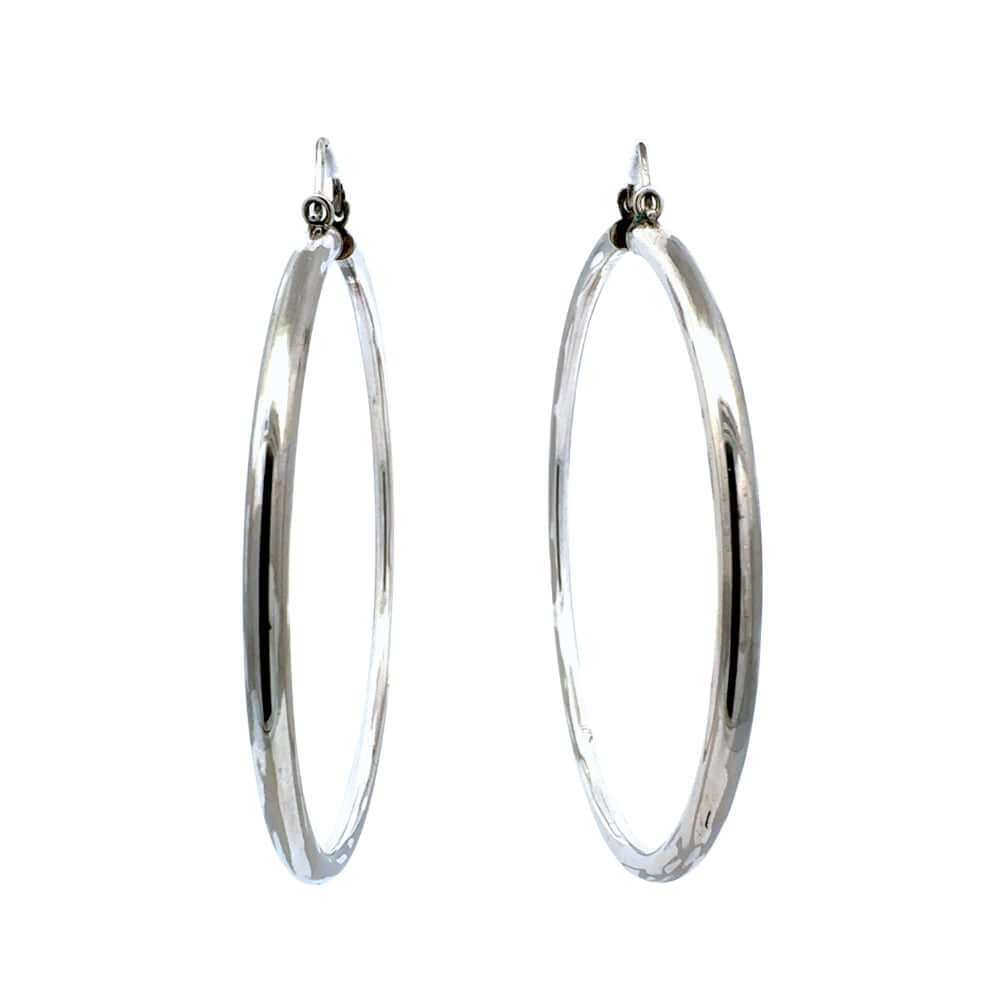 Pair of 8 cm silver hoop earrings on a white background