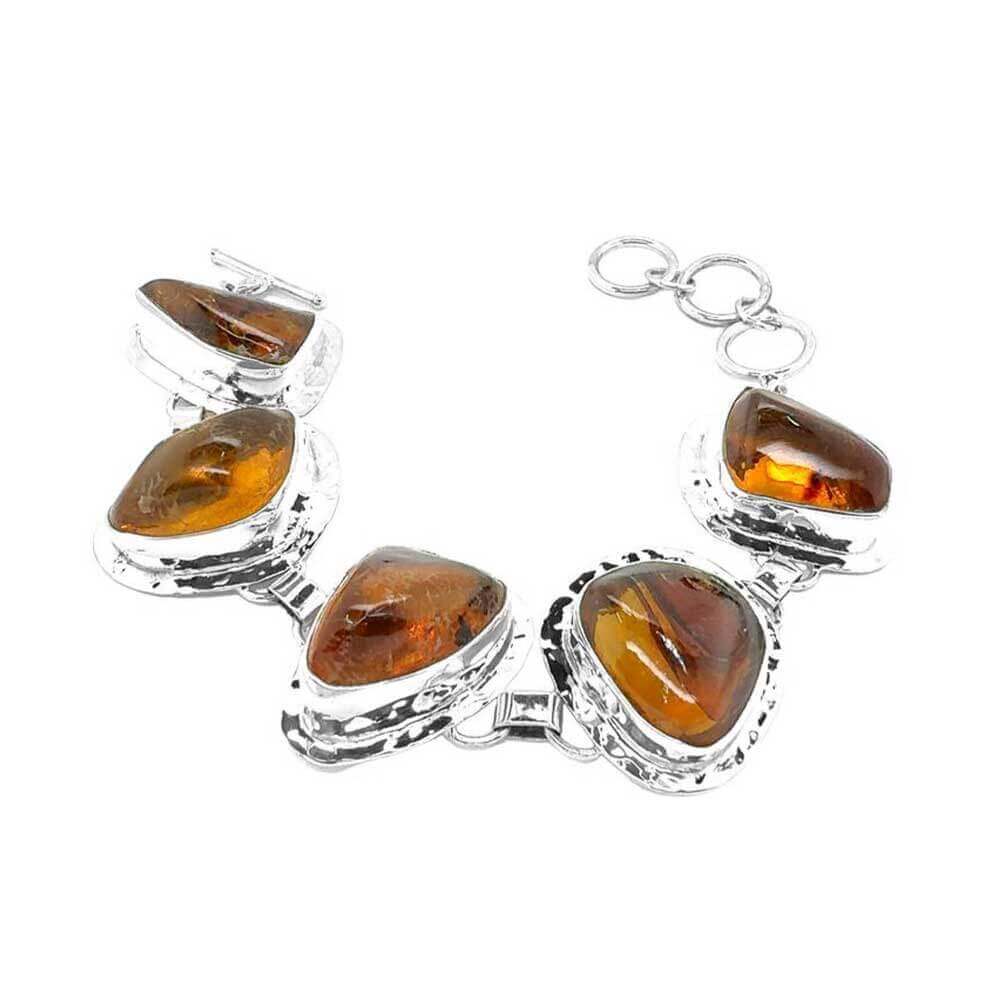 Analyzing image Hammered-950-Silver-Amber-Bracelet-front-Nueve-Sterling