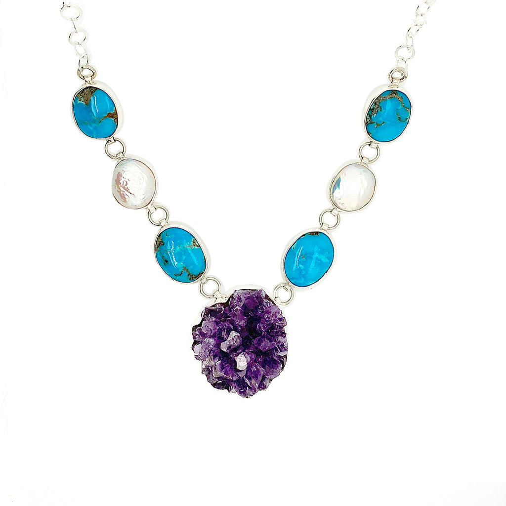 Handcrafted .925 silver necklaces with artisan-selected natural stones, personally curated from certified workshops in the silver capital of the world.