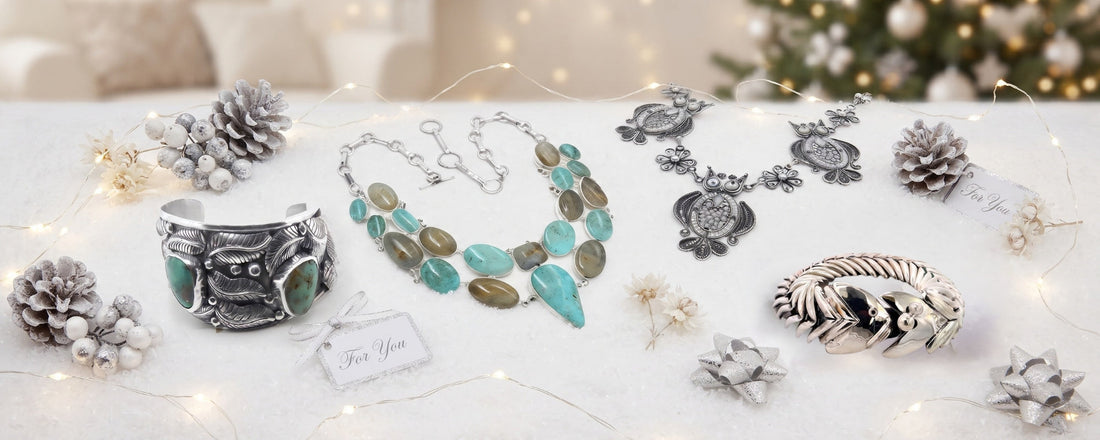 Festive snow scene featuring four unique silver and turquoise jewelry pieces, decorated with pinecones, lights, and gift tags.