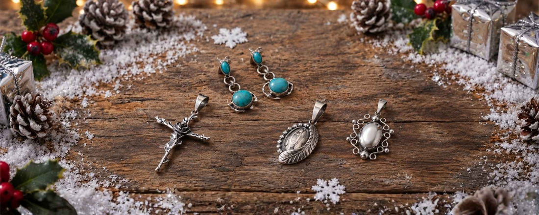 Sterling silver turquoise earrings and pendants on a rustic snowy wooden holiday display.