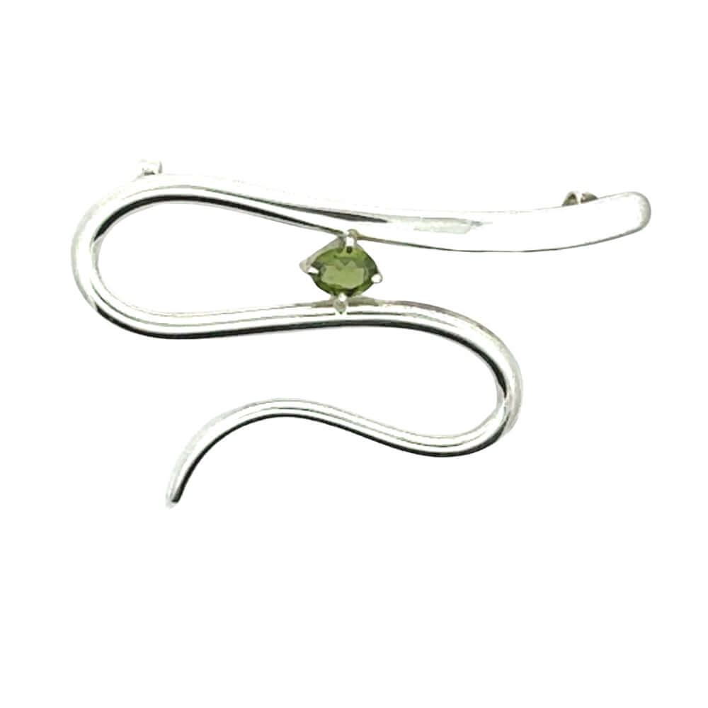 Front view of a hand-detailed .925 sterling silver pendant featuring a fluid, wavy design and a center-set green tourmaline.