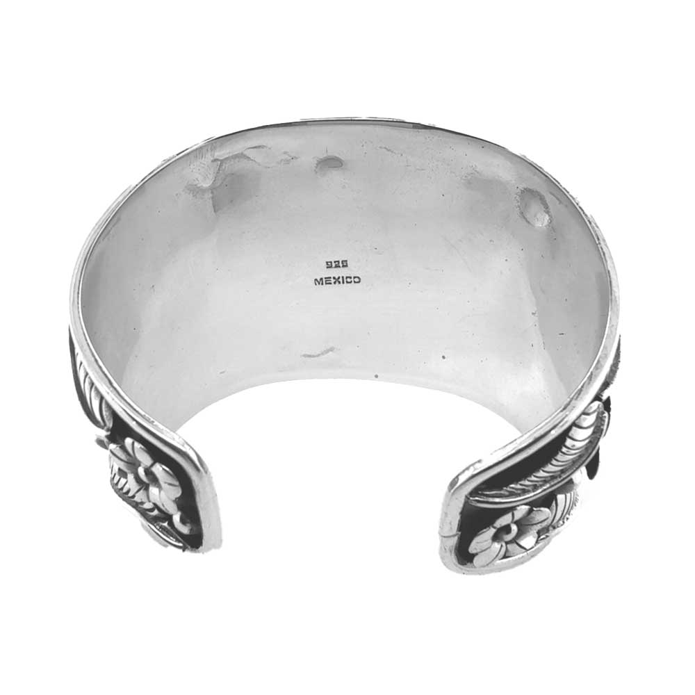 Close-up of the inner band showcasing the authentic 925 sterling silver stamp and artisan maker mark.