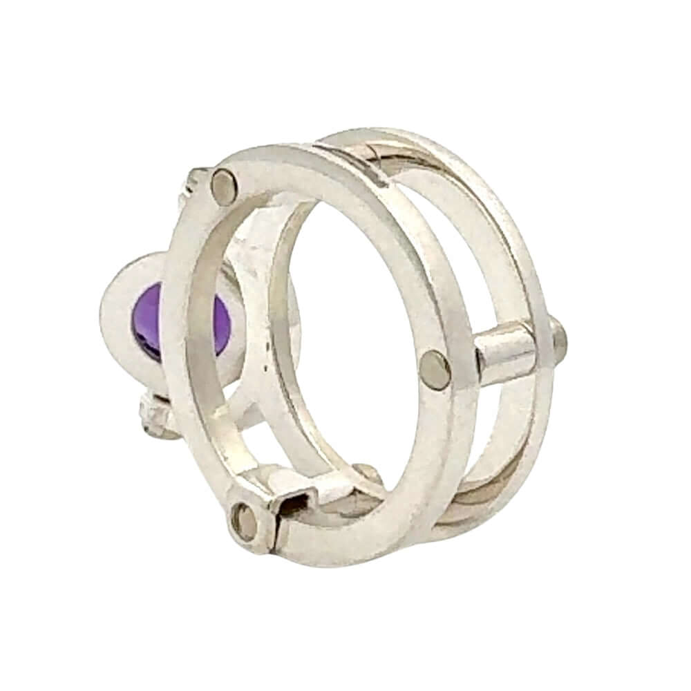 950 Silver ring with a purple gemstone on a white background
