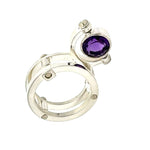 950 Silver ring with a purple gemstone on a white background