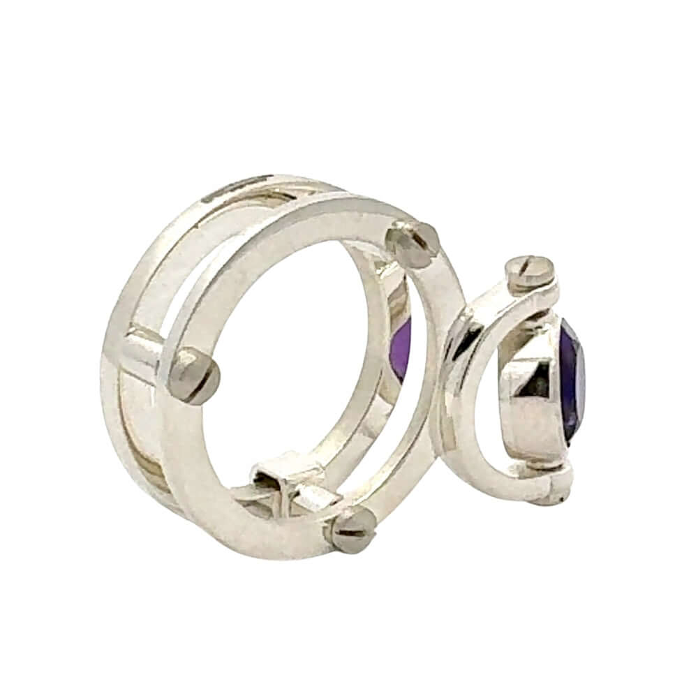 950 Silver ring with purple gemstone on a white background