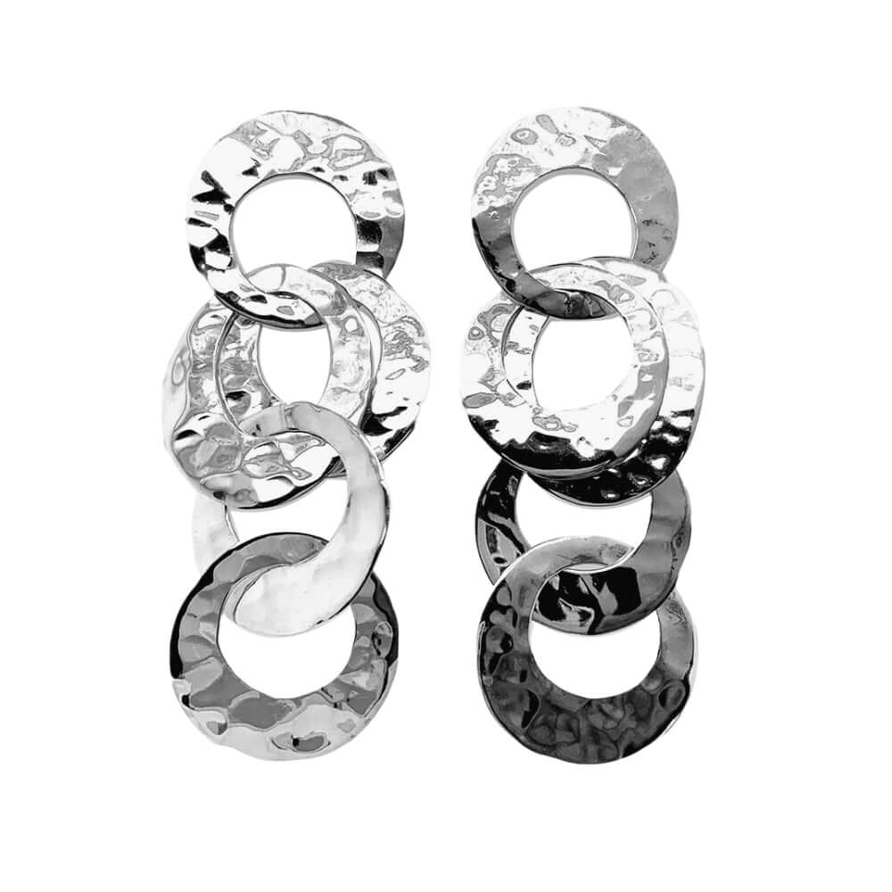 Pair of silver earrings on a white background