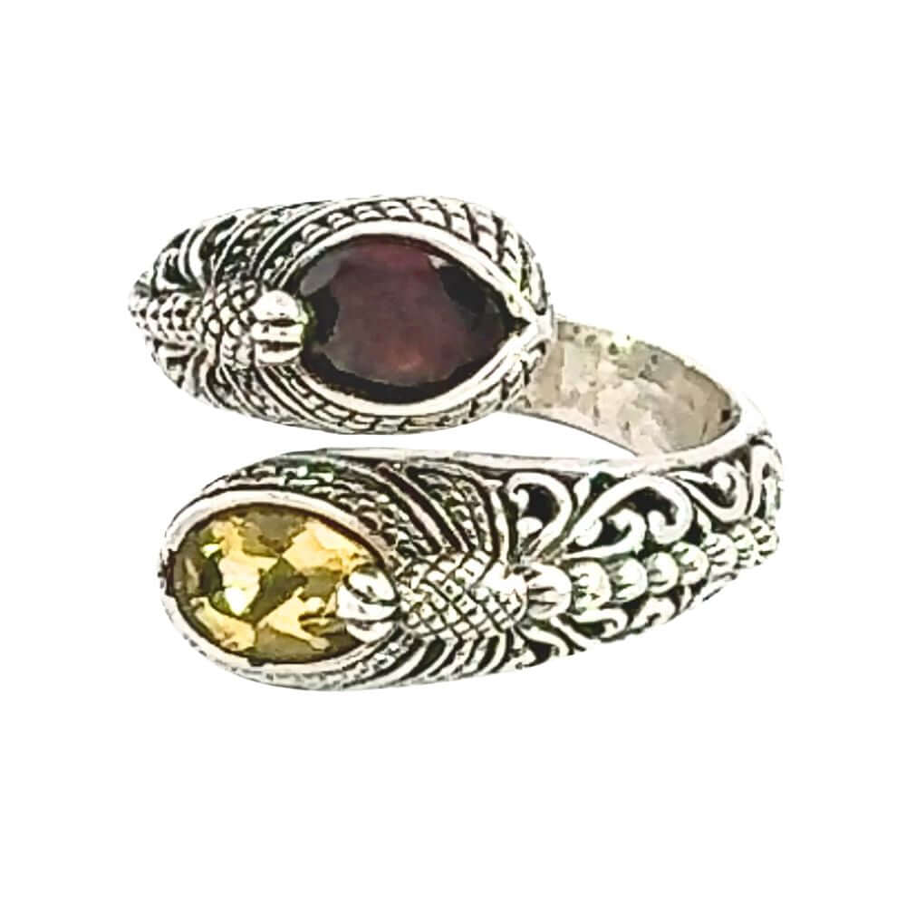 Silver ring with gemstones on a white background