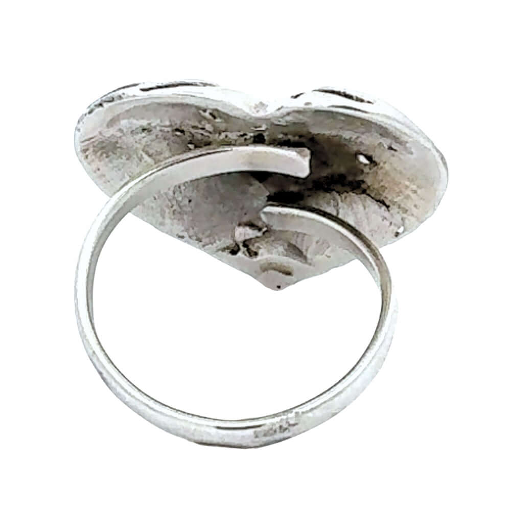 Silver ring back with a unique design on a white background