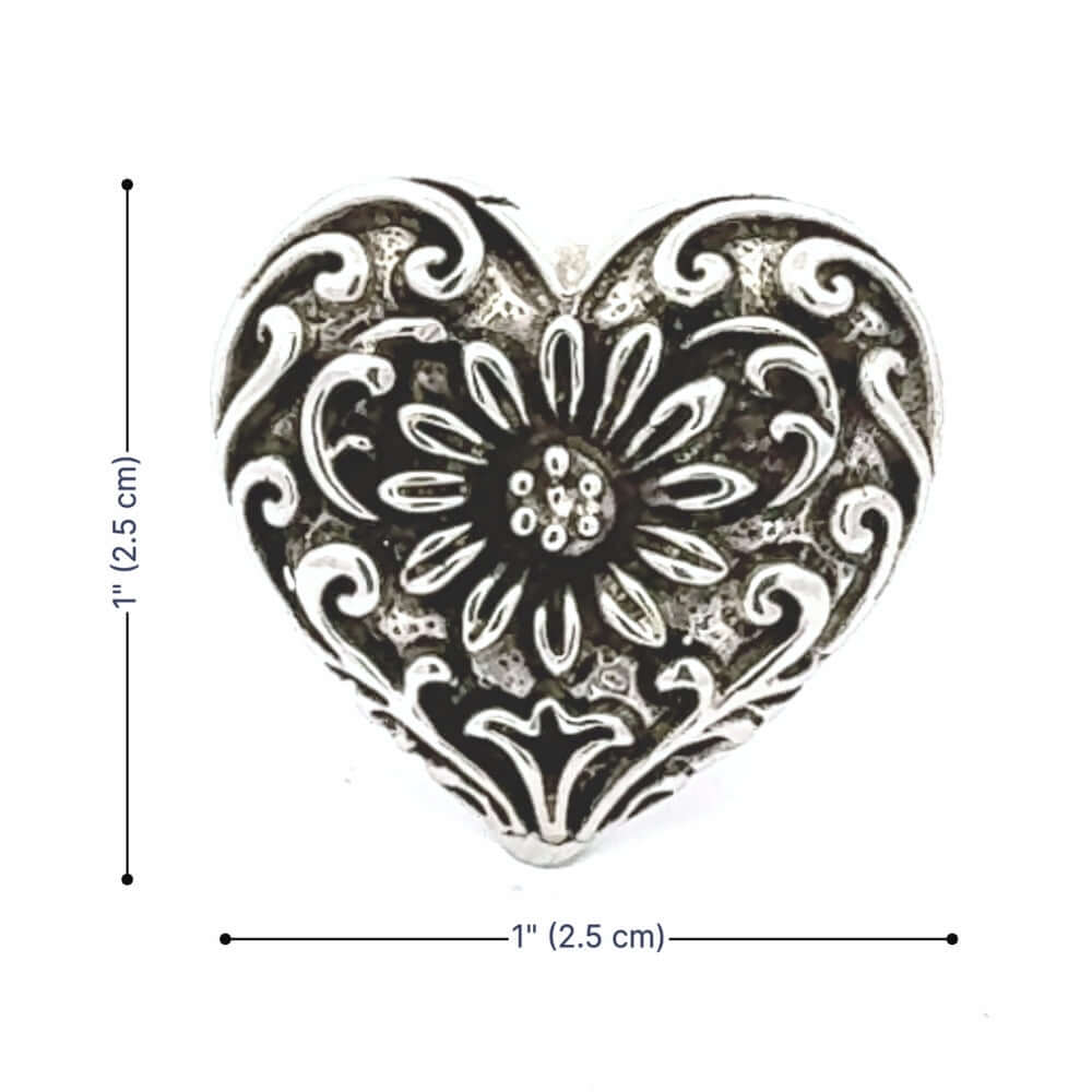 Taxco silver heart-shaped ring with intricate patterns on a white background and measurements