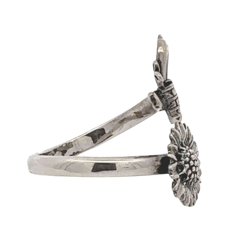 Silver ring with a unique design on a white background