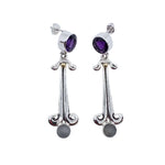 Silver earrings with purple and gray stones on a white background