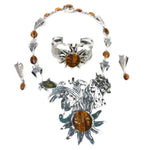 950 Silver jewelry set with tiger eye and amber stones on a white background