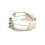 Taxco silver ring with blue topaz from the side on a white background