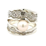 Taxco Silver ring with a pearl on a white background