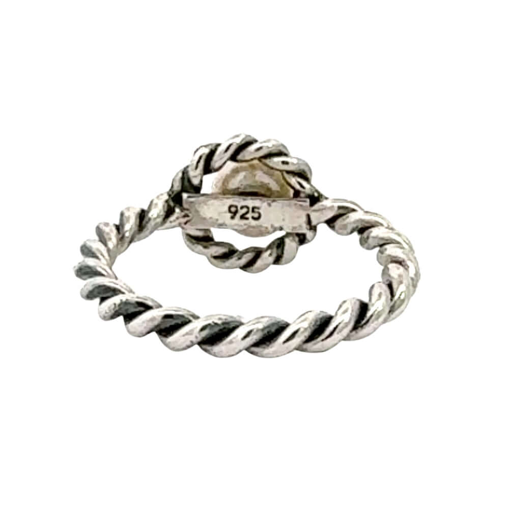 Silver twisted ring with '925' stamp on a white background