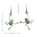 Frog-shaped earrings with green stones and measurements on a white background