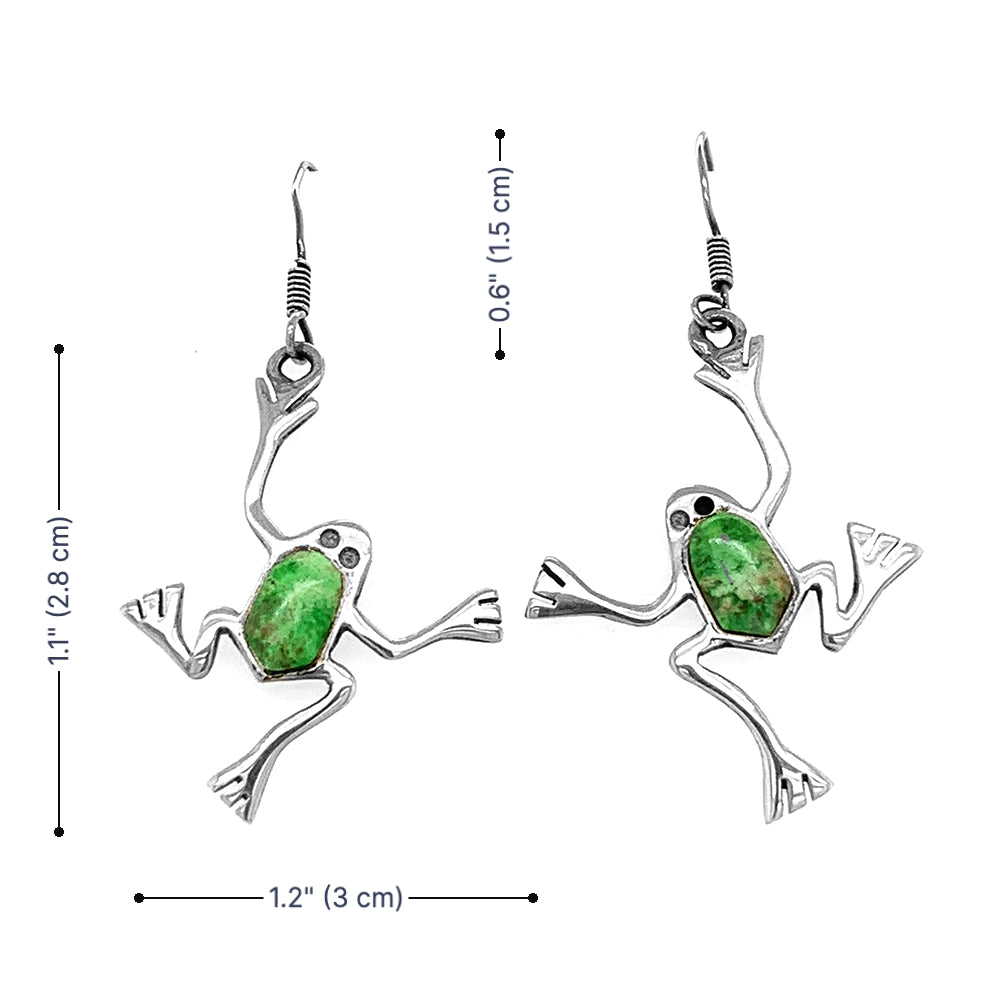 Frog-shaped earrings with green stones and measurements on a white background
