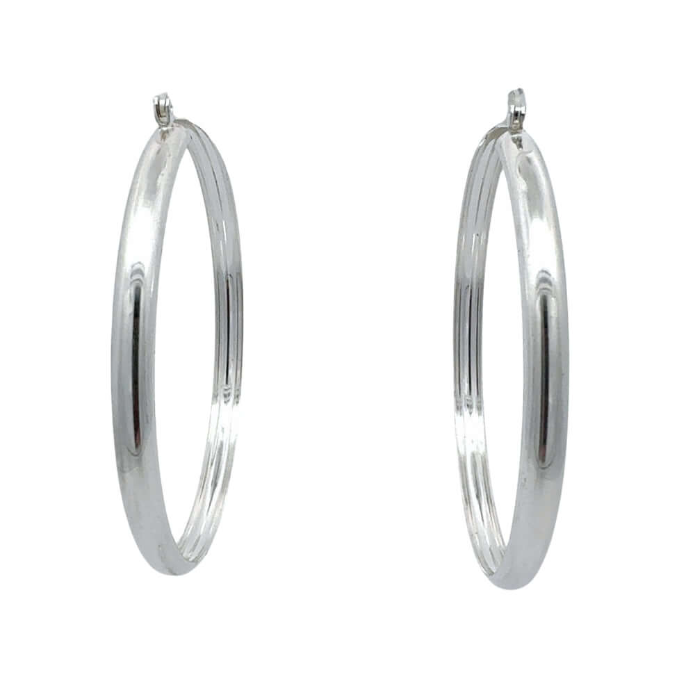 Pair of silver hoop earrings on a white background