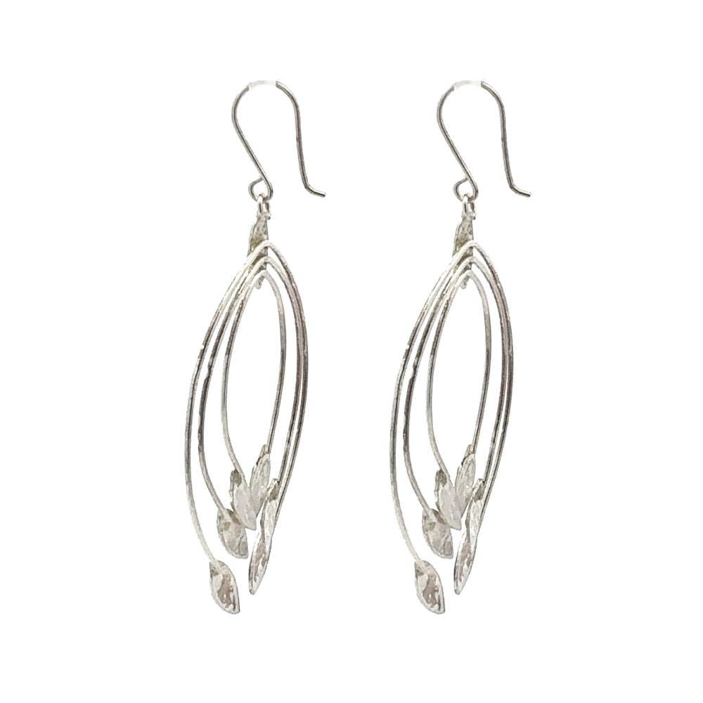 Pair of silver leaf-shaped earrings on a white background