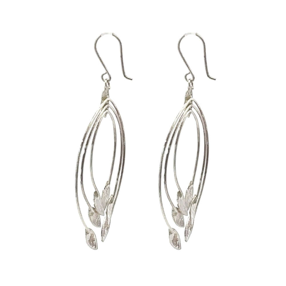 Pair of silver leaf-shaped earrings on a white background