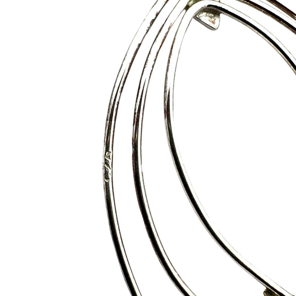 Close up of handmade Silver  Earrings stamp