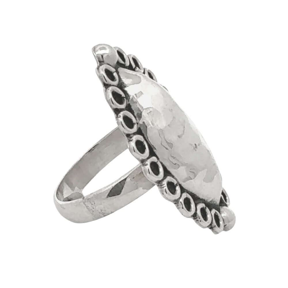 Silver ring with unique design on a white background