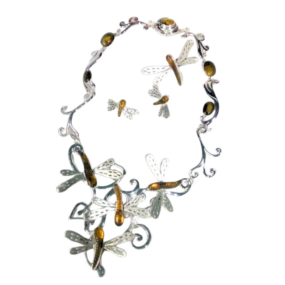 Ornate necklace with dragonfly designs on a white background