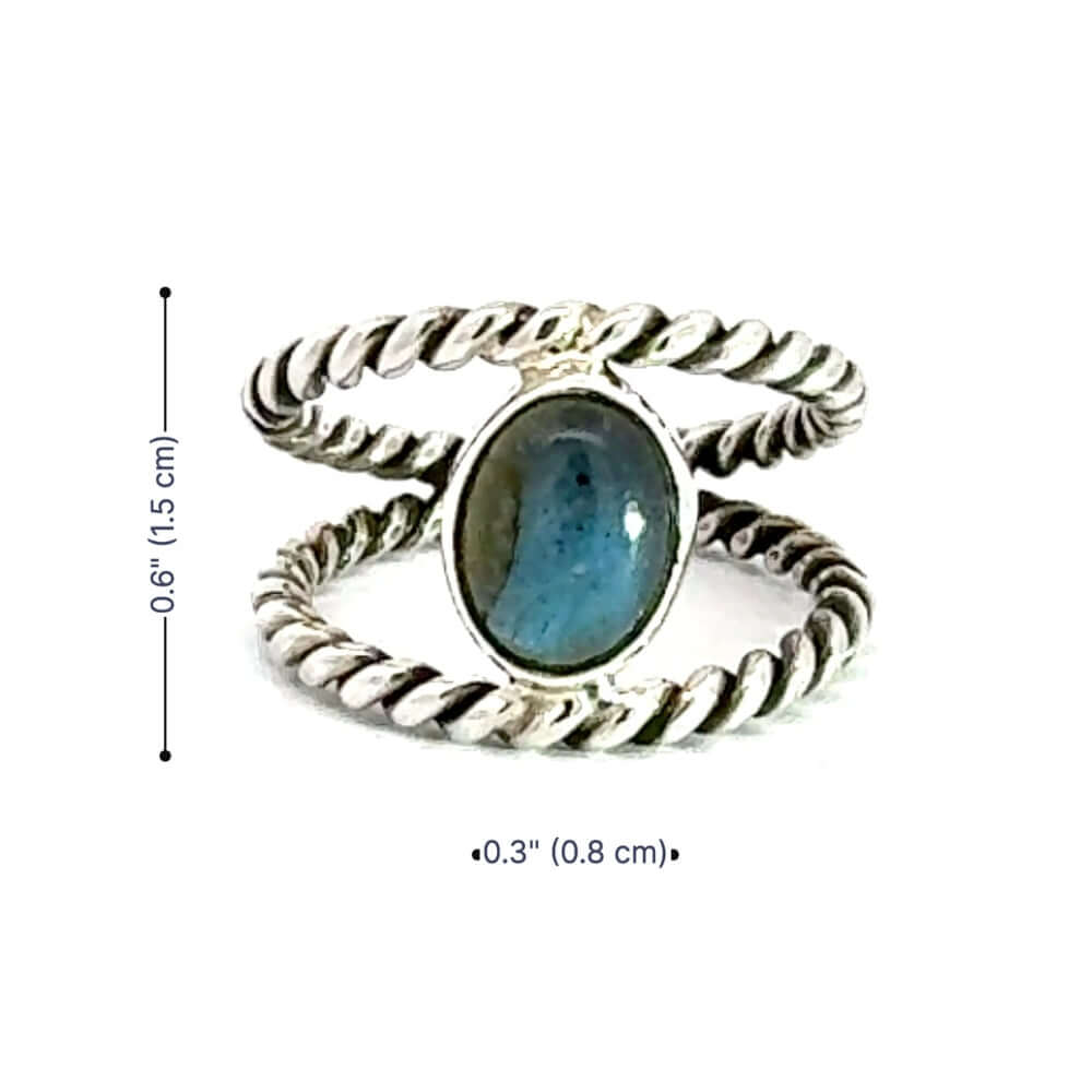 Silver ring with a blue stone and measurements on a white background