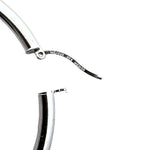 Silver hoop earring from Taxco close up to the s925 stamp on the closing clip