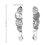 Silver earrings with intricate designs and measurements on a white background
