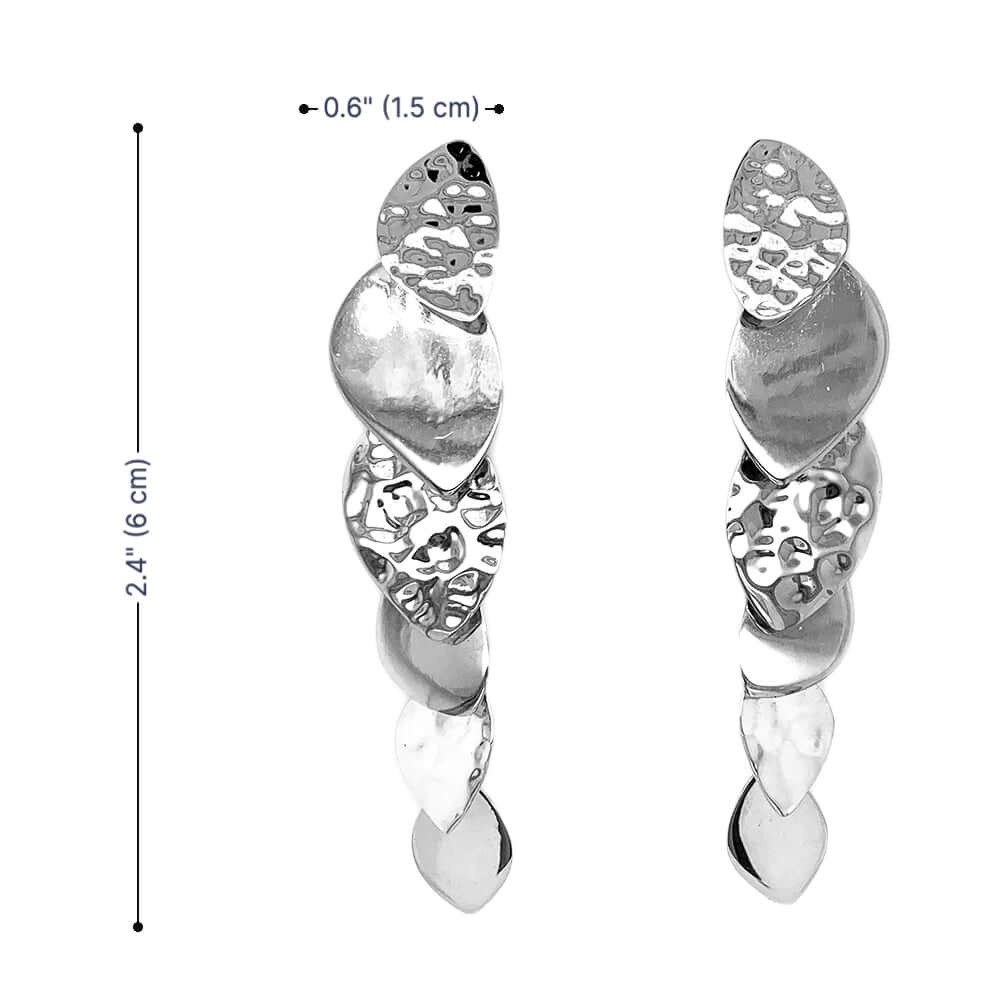 Silver earrings with intricate designs and measurements on a white background
