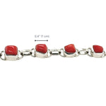 Bracelet with red coral and silver links on a white background and dimensions