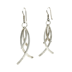 Pair of silver earrings on a white background