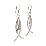 Pair of silver earrings on a white background