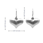 Silver heart-shaped earrings with measurements on a white background