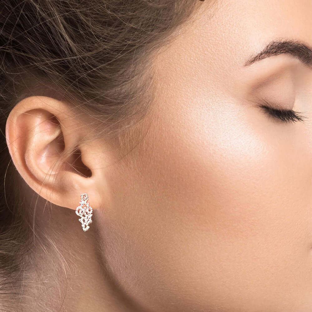 Modern-Silver-Caviar-Post-Earrings-with-model-Nueve-Sterling