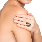 Oval-Orange-Cats-Eye-Silver-Ring-with-model-Nueve-Sterling