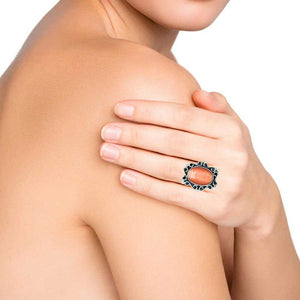 Oval-Orange-Cats-Eye-Silver-Ring-with-model-Nueve-Sterling