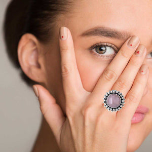 Round-Pink-Cats-Eye-Silver-Ring-with-model-Nueve-Sterling