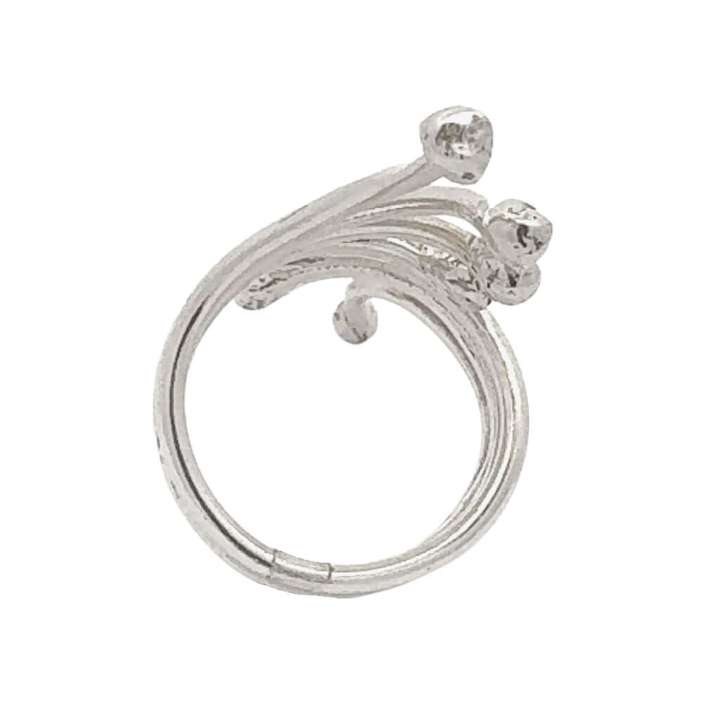 Silver ring with decorative elements on a white background