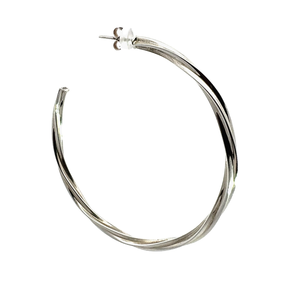 Silver hoop earrings on a white background