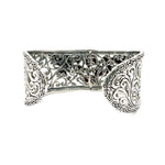 Silver filigree bracelet on a white background