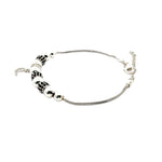 Silver bracelet with beads on a white background
