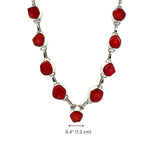Necklace with red coral and silver links on a white background