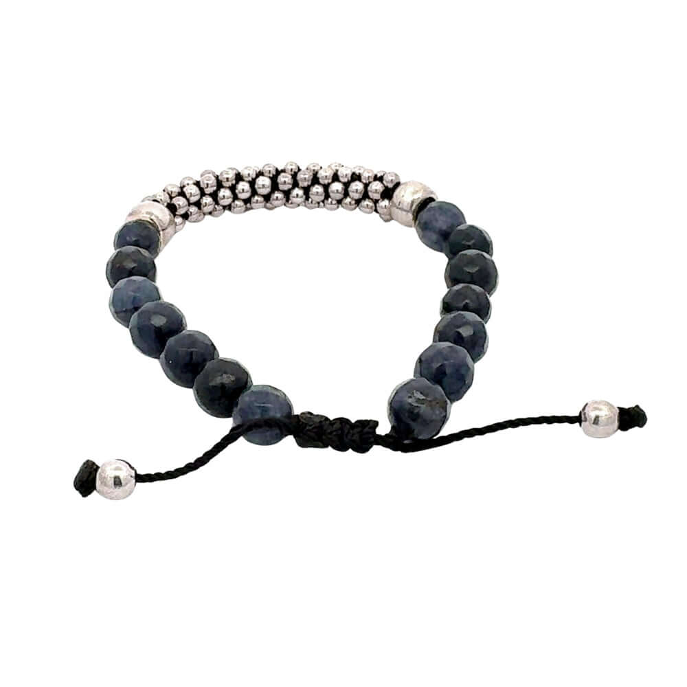 Blue agates beaded bracelet with silver accents on a white background