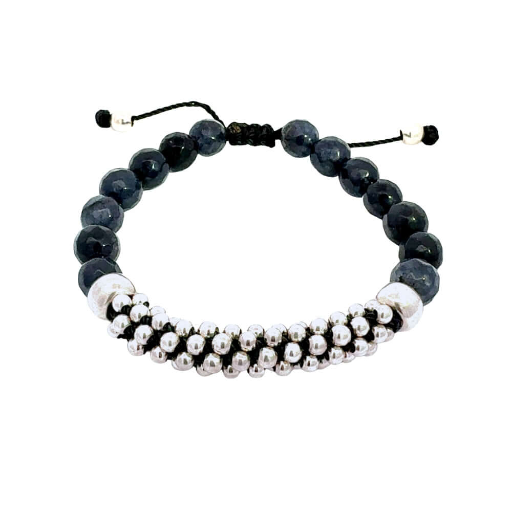 Beaded bracelet with black and silver beads on a white background