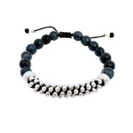 Beaded bracelet with black and silver beads on a white background