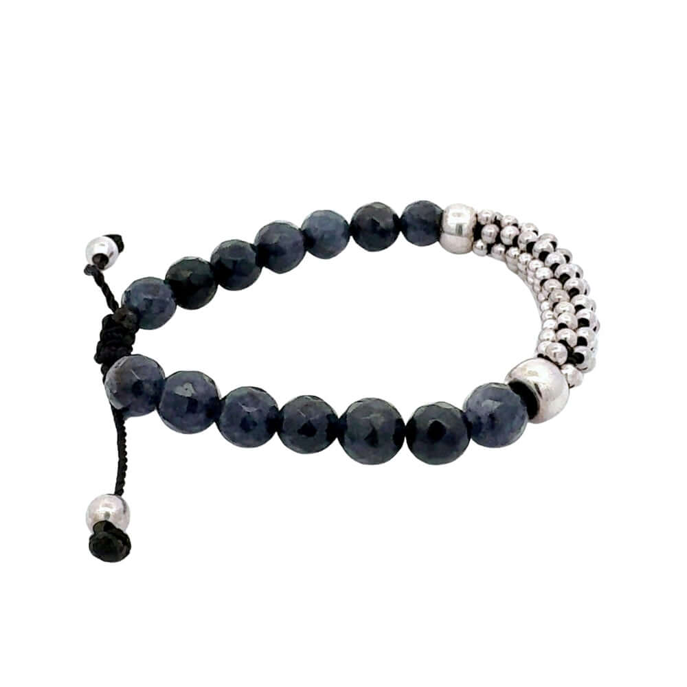 Blue agaates bracelet with silver beads on a white background